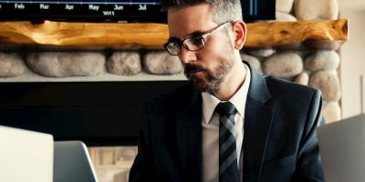 sad business man on his desk with laptop