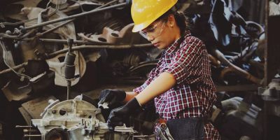 Woman in an industrial background