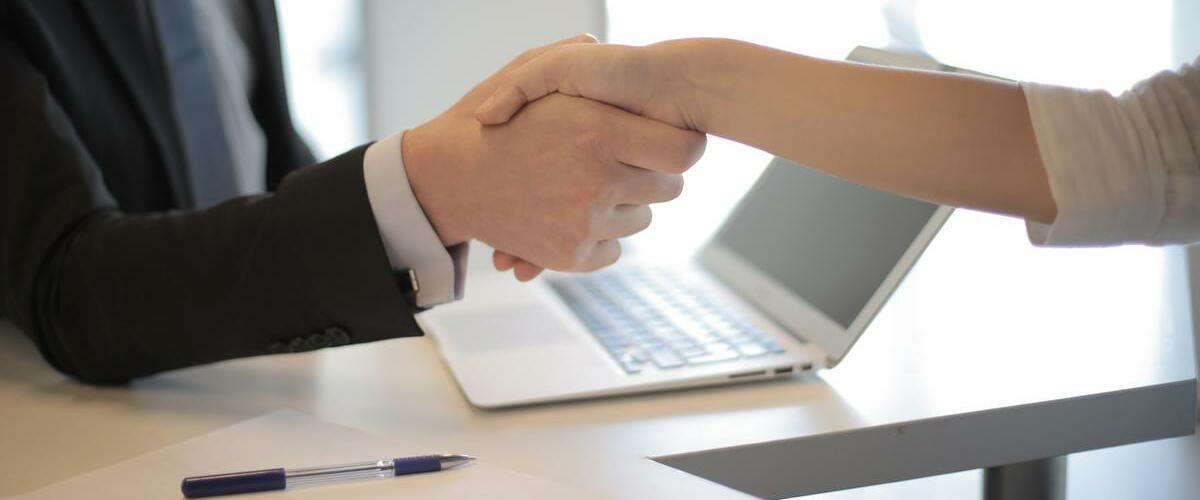 person-in-black-suit-hired-an-employee-3760069-2 person-in-black-suit-hired-an-employee